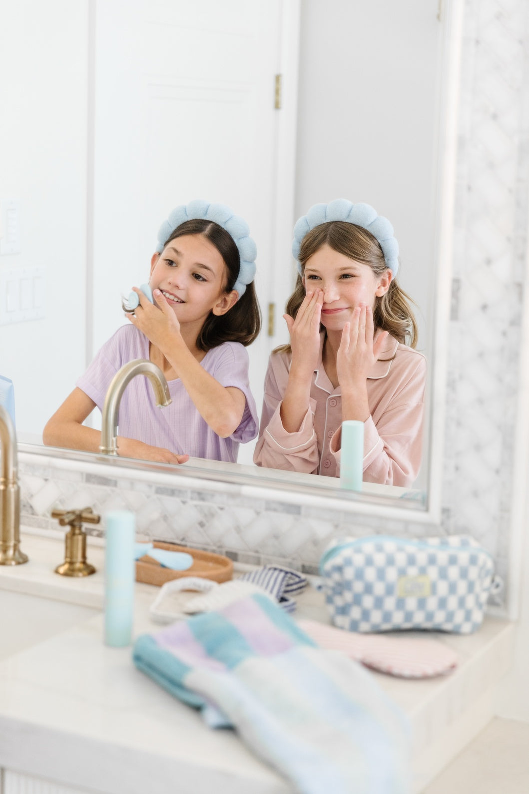 Load video: Tween girl showing how to use The Dew Generation products.